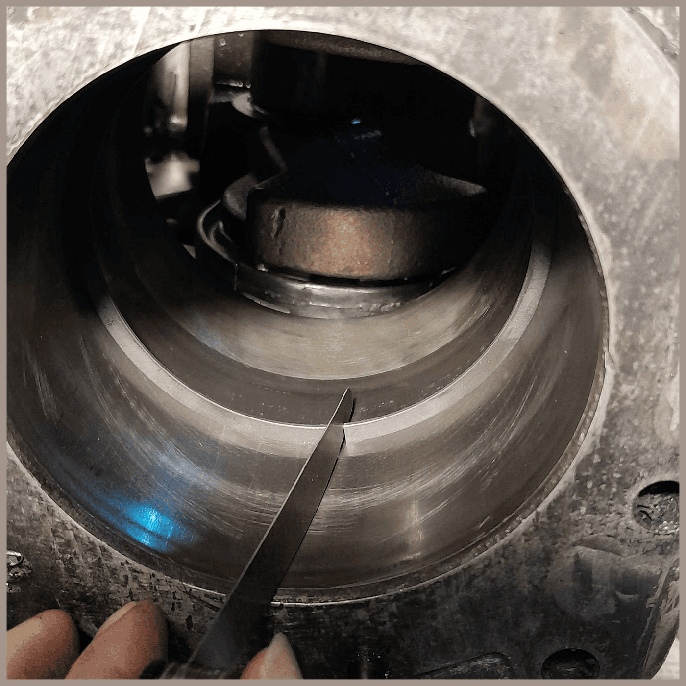 The Piston Ring: Sealed by the Gas It Holds Back
