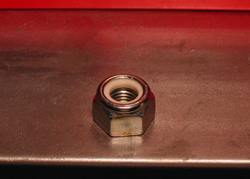 Nylon Insert Lock Nut: a Nylon Collar Crimped into a Steel Nut