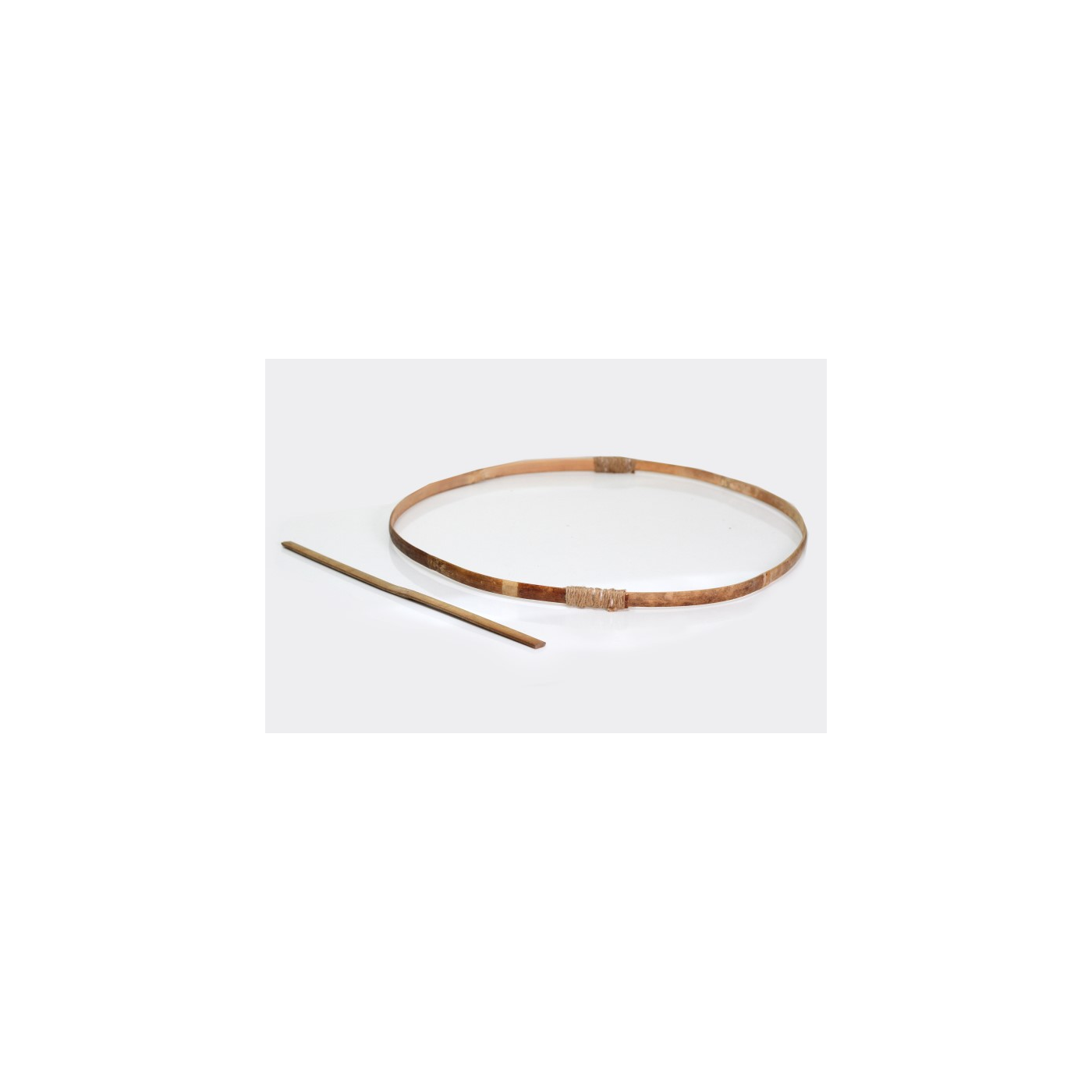 Lo Wong Klom (Bamboo Hoop and Stick) — a 1 m Bamboo Half 2-3 cm Wide, Shaved Thin Inside Leaving the Skin, Bent into a Ring and Tied, with a 20-30 cm Striking Stick; Bowled Along in Races or Relays