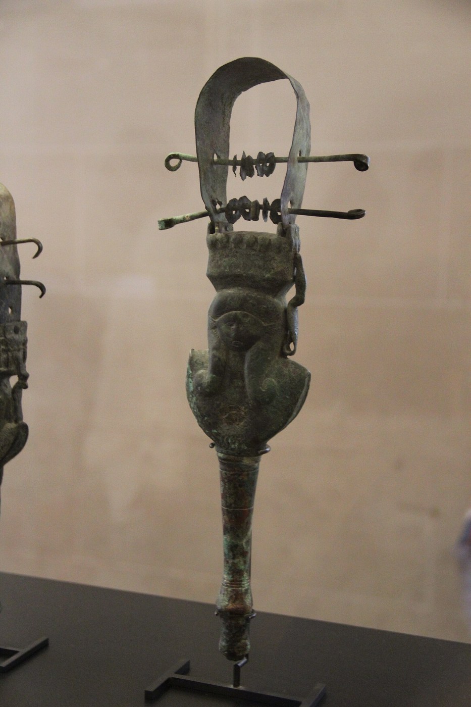 Sistrum Jingles: Thin Bronze Discs That Slide on the Crossbars