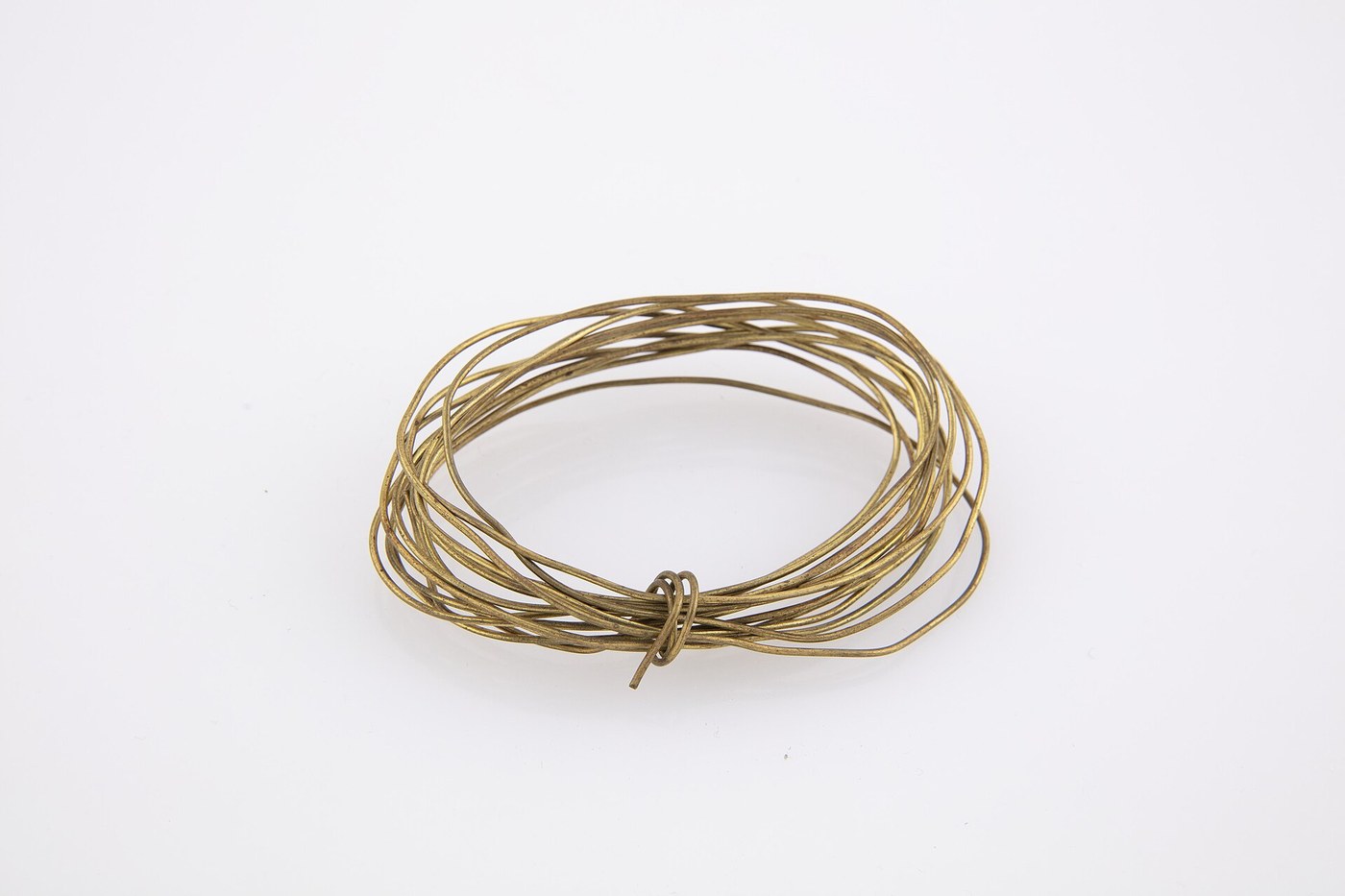Thin Brass Wire Drawn Through a Drawplate